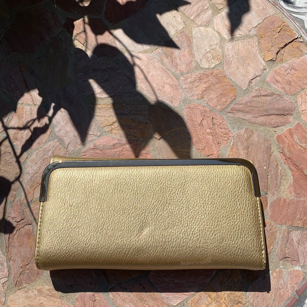 Gold clutch